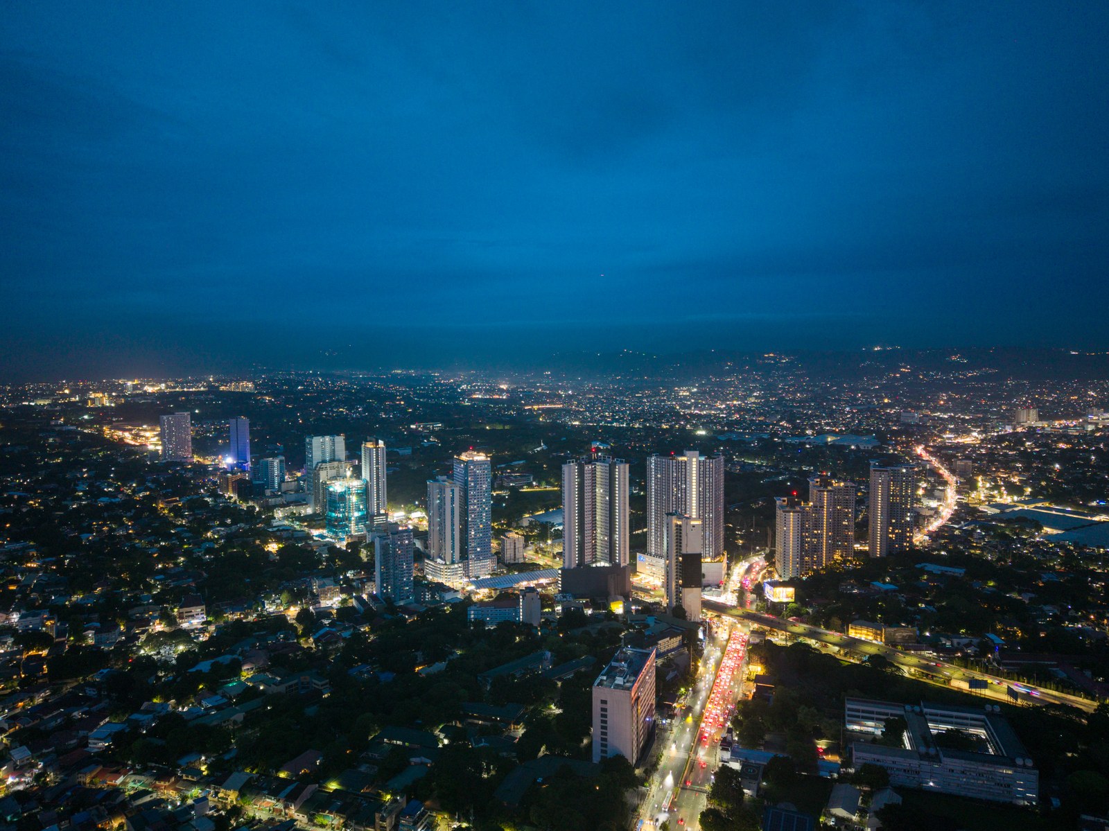 The Oriana and Quezon City skyline at night